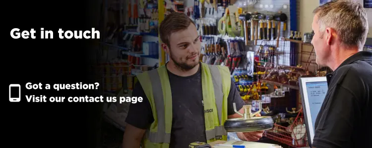 Branch colleague speaking with a customer behind the trade counter